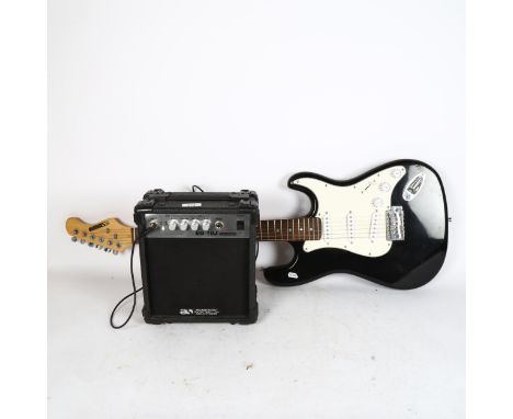 A Acoustic Solutions 6-string electric guitar, and an Acoustic Solutions EG-10J amplifier 