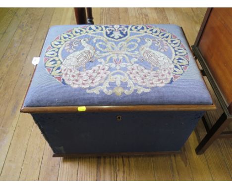 An early Victorian rosewood and blue upholstered blanket box, the hinged lid with tapestry seat 63cm wide 48cm deep 46cm high