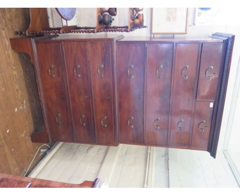 A George III mahogany chest on chest, the dentil cornice over two short and three long graduated drawers over a base with thr
