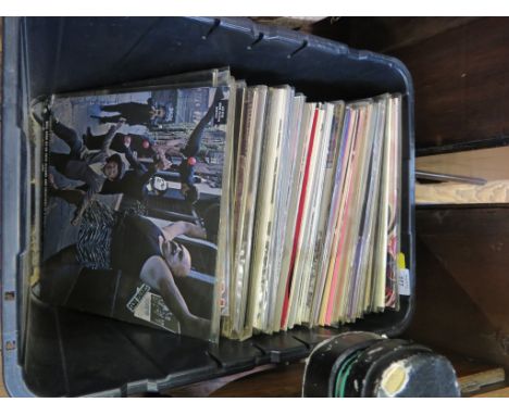 A collection of vinyl albums, including Pink Floyd, Marrilion, Led Zepplin, The Who, etc