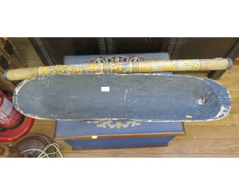 An Aboriginal didgeridoo, 119cm, and a tribal painted mask, 98cm long (2)