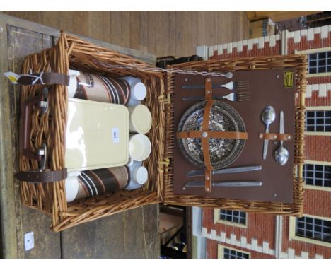 A Brexton wicker picnic set, for two, with ceramic plates