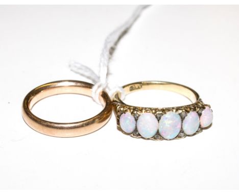 A five stone opal ring with rose cut diamonds between each opal, set in 18 carat gold, together with a 9 carat gold wedding r