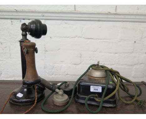 A 1930s stick telephone and another telephone of the same period (2)
