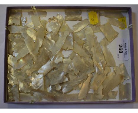 A collection of Mother of Pearl gaming counters, fish and ticket shaped, approx 100, some damaged