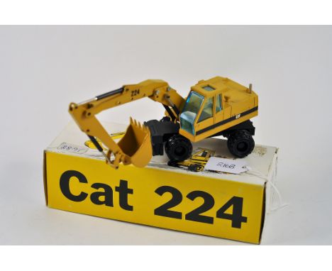 NZG MODEL 259 CAT 224 WHEEL -TYPE EXCAVATOR SCALE 1:50 VGC