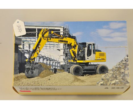 NZG MODEL 780 LIEBHERR A 924 HYDRAULIC EXCAVATOR KIBAG BLUE AND WHITE SCALE 1:50 GC WITH BOX