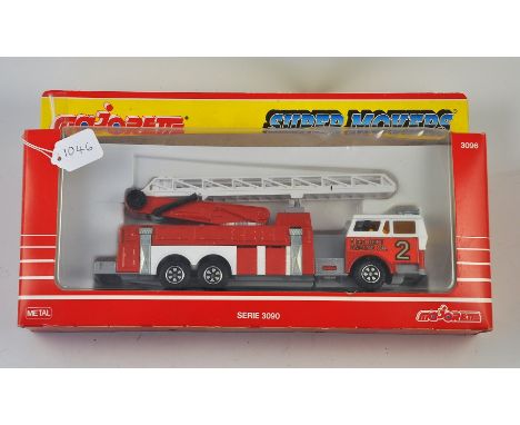 MAJORETTE MODEL NO. 3096 SUPER MOVERS FIRE ENGINE WITH EXTENSION LADDER IN BOX GC.  
