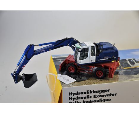 NZG MODEL 780/03 LIEBHERR 924 HYDRAULIC EXCAVATOR G MESKEN BLUE AND RED SCALE 1:50 GC