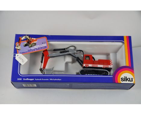 1:55 SCALE SIKU MODEL NO - 3510 ' MENCK M500H ' HYDRAULIC EXCAVATOR IN BOX SLIGHT DAMAGE TO CORNER OF BOX PRE 1990 GC 