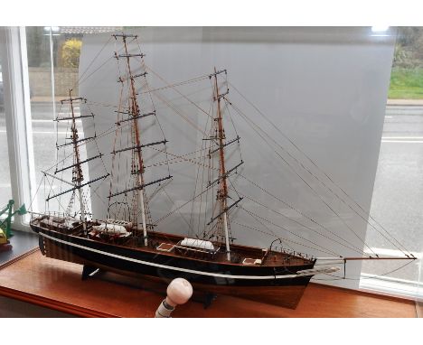 A LARGE SCRATCH BUILT MODEL OF A CLIPPER SHIP 'THE CUTTY SARK' IN GLASS DISPLAY CASE (LIGHT INCLUDED) MEASURING 124CM (W) X 4