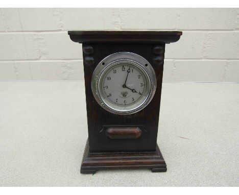 A mounted automobile clock by Smiths Cricklewood Works, London . No P554.591