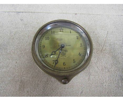 A Smith's 8-day bezel wind dashboard clock for early 1920's Rolls- Royce or similar