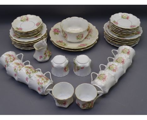 CONTINENTAL PORCELAIN, floral decorated teaware, 39 pieces consisting two sandwich plates, 12 side plates, 11 saucers, 12 cup