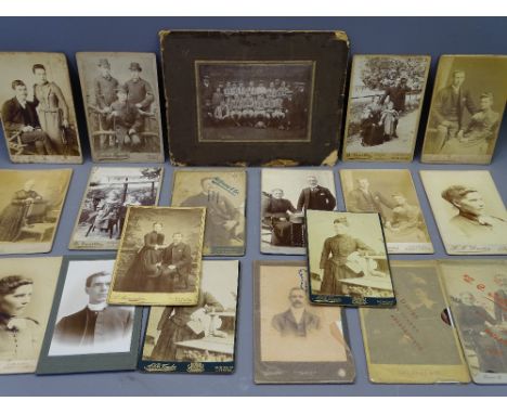 EIGHTEEN VICTORIAN CABINET CARD PHOTOGRAPHS and an early card mounted photograph of a football team, 11.25 x 16cms, the cabin