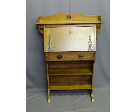 ARTS &amp; CRAFTS STYLE OAK BUREAU BOOKCASE having a railed top with carved applied corbels, stylized strap hinges and handle