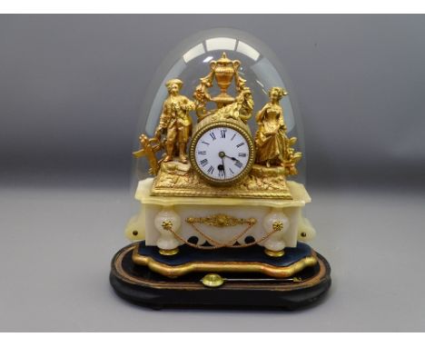 FRENCH GILT METAL &amp; ALABASTER MANTEL CLOCK under a glass dome, 45cms overall H, 30 x 30cms the clock, the enamel dial set