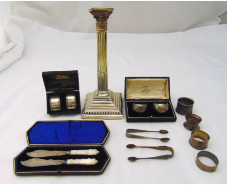 A quantity of hallmarked silver to include a cased set of Mappin and Webb napkin rings, a cased set of mother of pearl butter