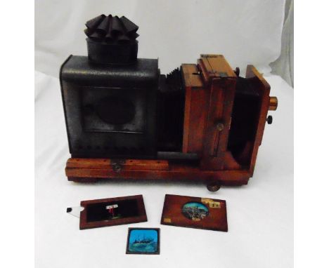 Thornton Pikard magic lantern projector with oak carcass and frame, double bellows, metal housing for the candle, to include 