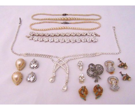 A quantity of crystal, diamante and costume jewellery to include a Napier necklace, a pair of matching bracelets, earrings, t