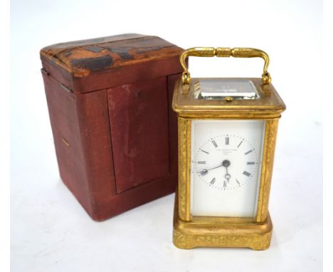 A 19th century English chased brass carriage clock by A B Savory &amp; Sons, Cornhill no 18582 the two train eight-day moveme