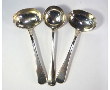 A pair of George IV silver OEP sauce ladles, William Bateman I, London 1821, to/w a George V rat-tail sauce ladle, Sheffield 