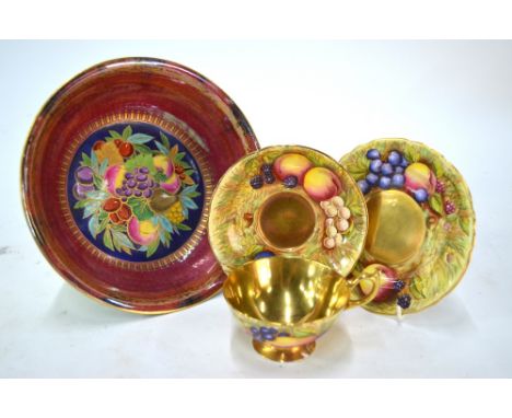 An Aynsley trio printed and painted with frui by D Jones and N Brunt to/w a Minton lustre bowl decorated with gilt edged frui