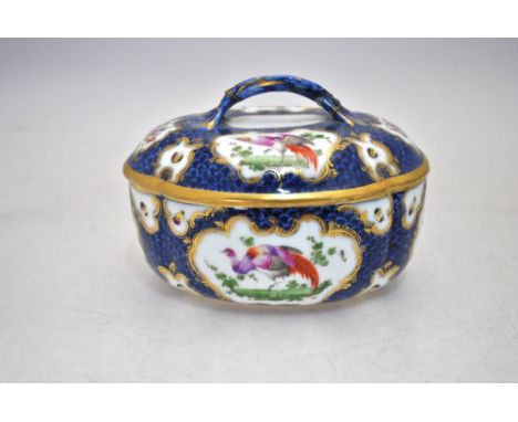 An 18th century Worcester shaped oval tureen and cover, blue scale ground painted with gilded reserves of exotic birds, flowe