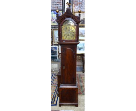 Peter Nichols, Newport (Isle of Wight) a late 18th century eight-day mahogany longcase clock, the engraved brass arched dial 