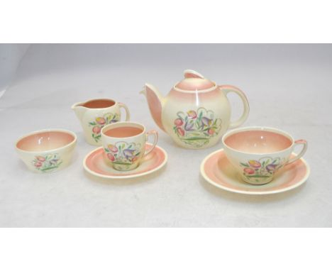 An Art Deco Susie Cooper Kestral shape part dinner, tea and coffee wares, floral decorated with pale pink shading, &nbsp;patt