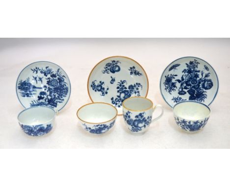 Two 18th century Worcester blue and white tea bowls and saucers, one decorated with the 'Fence' pattern, the other with roses