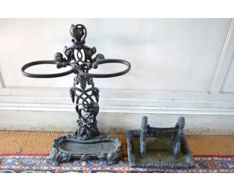 A cast Iron Art Nouveau two-division stick stand 71 cm high to/with a cast iron boot scraper (2)