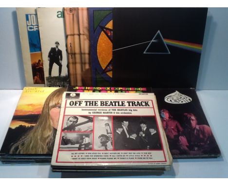 A collection of 28 vinyl 33rpm LP records to include three Beatles original pressings, Pink Floyd, John Mayall, Animals, Pent