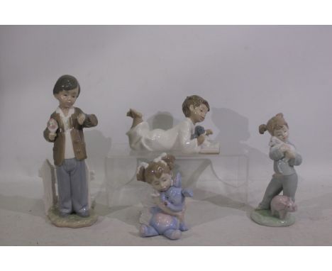 Nao - Four Nao figurines - Lot includes a girl reading a book, boy checking his watch, girl cuddling a sheep, girl cuddling r