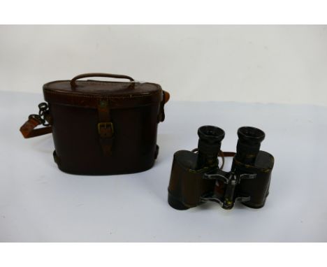 Vintage binoculars, the leather case marked Binocular Prismatic No 2, Case Mk I. [W]