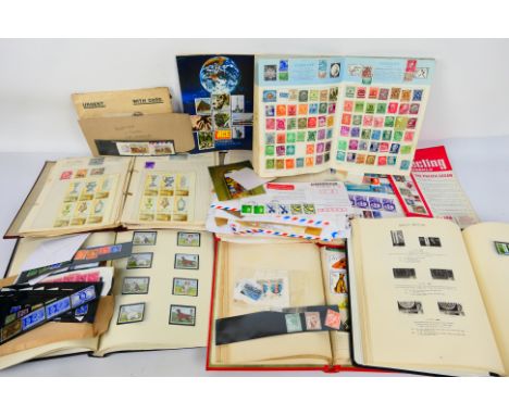 Philately - Five albums / stockbooks to include a Windsor Loose Leaf Album For The Stamps Of Great Britain (sparsely filled u