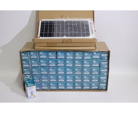 Unused Shop Stock - A box of 50 warm white 28w 240v energy saving halogen light bulbs and four USB solar chargers. [W]