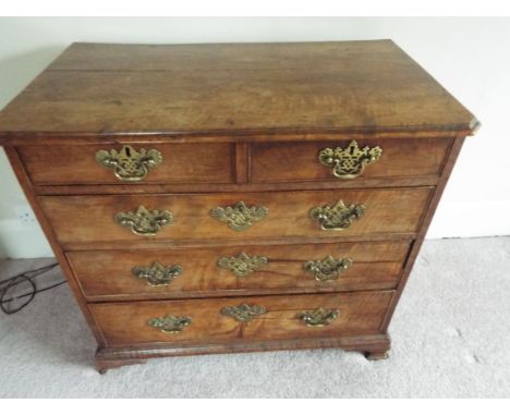 A Georgian chest of two over three drawers with fancy brass drop handles, 74 cm (h) x 80 cm (w) x 45.5 cm (d)   (b) This item