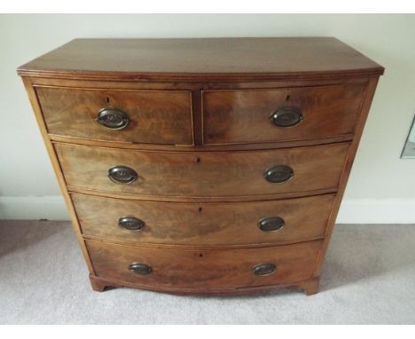 A Victorian bow fronted chest of two over three drawers with brass drop handles, 95 cm (h) x 98 cm (w) x 48 cm (d)   (b) .The