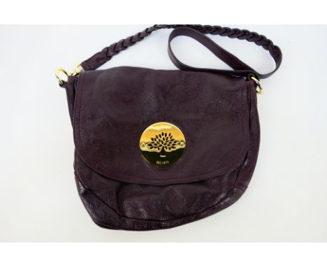 Mulberry - a maroon Mulberry handbag and shoulder strap, labelled with markers, receipt  inside zip pocket displaying purchas