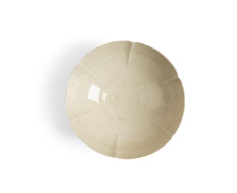 QINGBAI FOLIATE BOWL SONG DYNASTY supported on a short splayed foot, the finely moulded body with its six lobed sides decorat