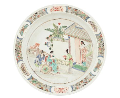 WUCAI BASIN QING DYNASTY, 19TH CENTURY sturdily potted, painted in the central medallion with narrative figures, enclosed by 