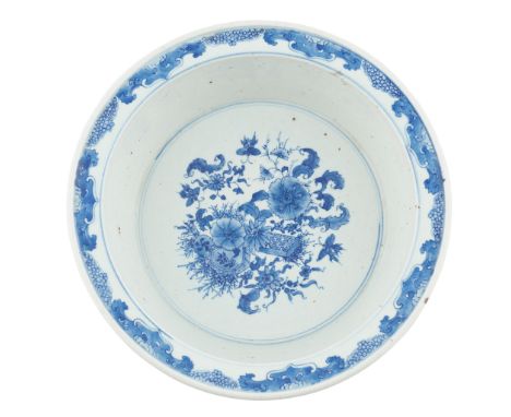 BLUE AND WHITE 'FLOWER' BASIN decorated in the centre with a dense flower bush, the exterior with three clutters of bamboo sp
