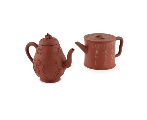 TWO YIXING STONEWARE TEAPOTS comprising: a cylindrical form teapot decorated with three bands of 'Shou' character on the exte