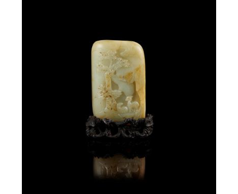 LARGE PALE CELADON JADE BOULDER WITH YELLOW SKIN 19TH-20TH CENTURY of rectangular form, carved on one side in low relief with