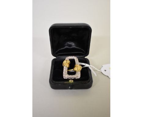 A Kutchinsky diamond studded cocktail ring&nbsp;stamped 18k, 24.7g total weight, in Kutchinsky box.En suite with next lot. 