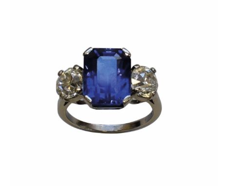 A good 9.5ct natural Ceylonese sapphire and diamond ring, the two old European cut diamonds&nbsp; approx 1ct each, platinum s