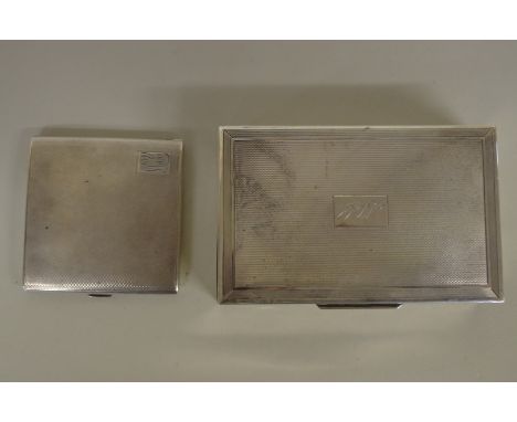 A&nbsp;silver&nbsp;rectangular engine turned cigarette box, by S J Rose &amp; Son,&nbsp;London 1962; together with a silver c