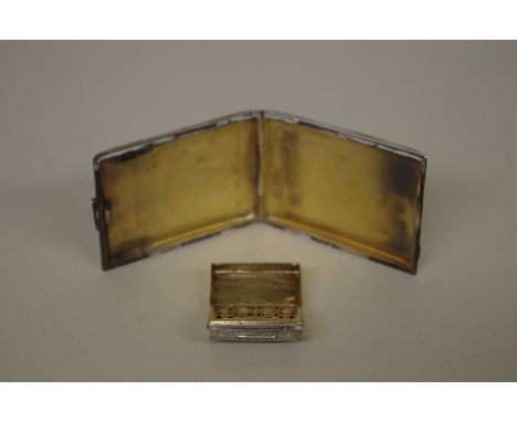 A George III silver vinaigrette,&nbsp;by Joseph Willmore,&nbsp;Birmingham 1816, 3 x 2cm; together with a silver engine turned