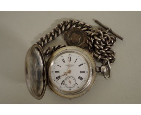 A continental hunter pocket watch, the 4.2cm white enamel dial decorated Roman numerals and signed Quartier Girard, the case 